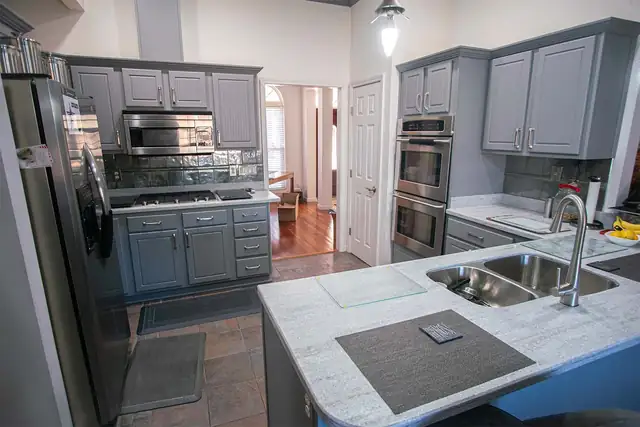 Kitchen refaced with Victory style doors and drawer fronts in Dust Grey